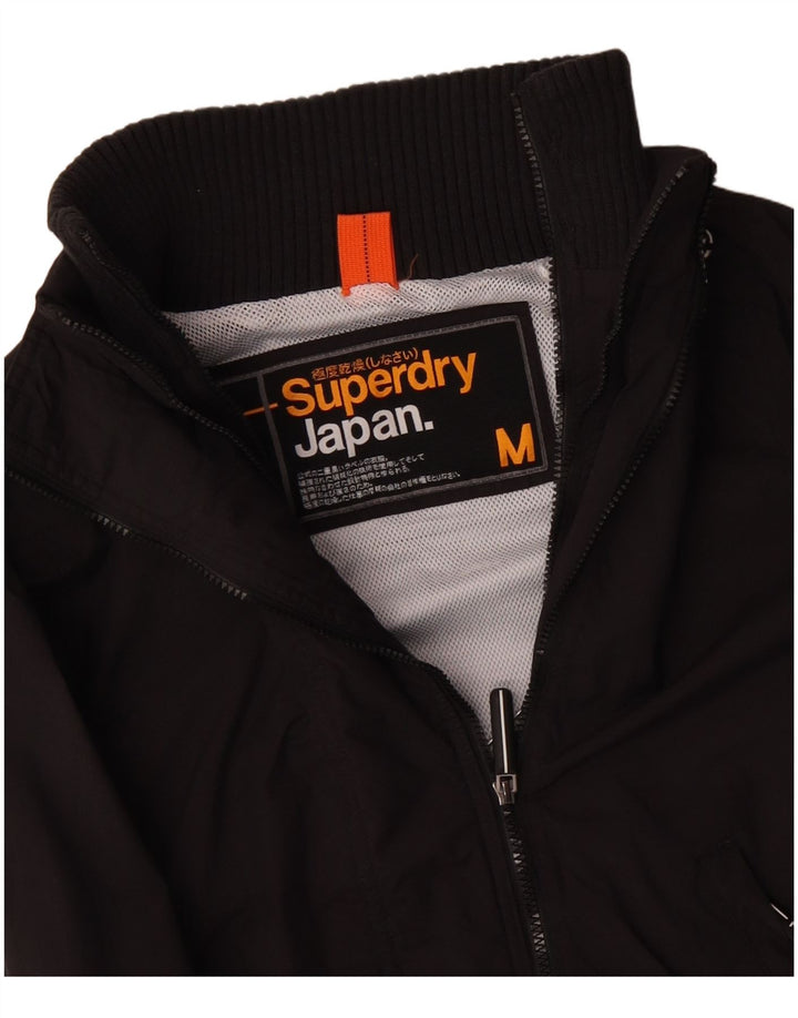 SUPERDRY Damen Windjacke UK 14 Mittelschwarzes Polyester