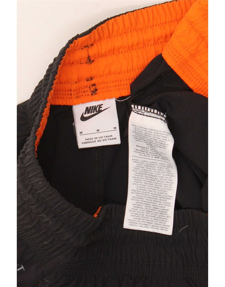 Nike Herren-Cargo-Trainingsanzug-Hose mit lockerer Passform und Jogginghose aus mittelschwarzem Nylon