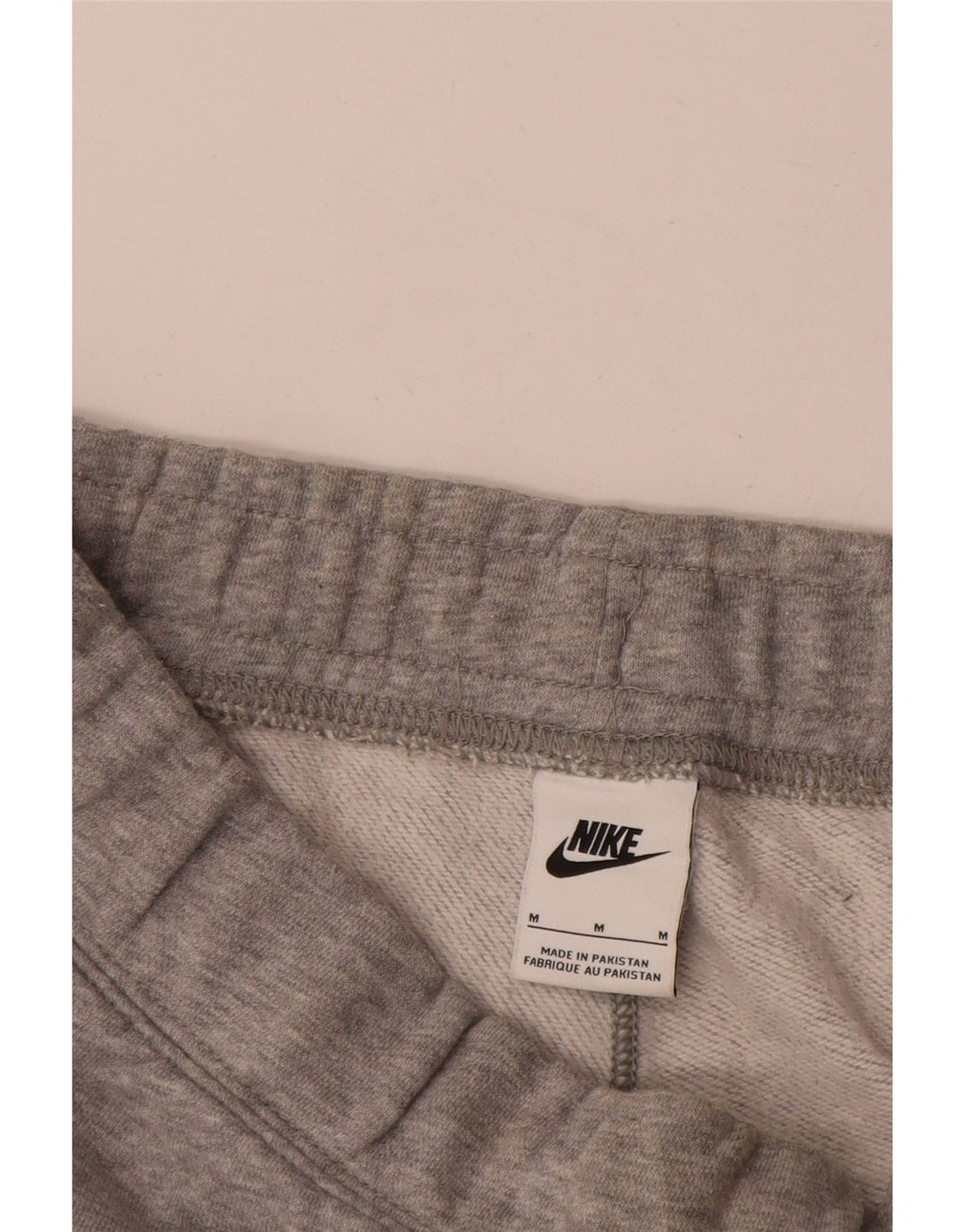 Nike Herren-Trainingshose mit Grafik, mittelgrau, Farbblock
