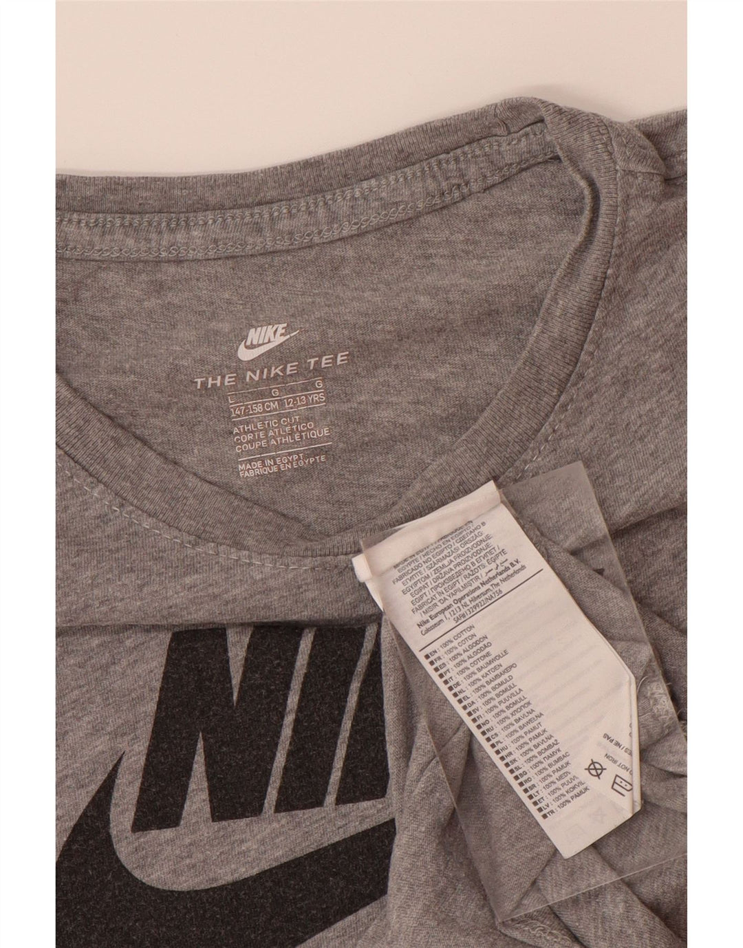 NIKE Jungen-T-Shirt mit sportlichem Schnitt und Grafik, 12–13 Jahre, Größe L, aus grauer Baumwolle