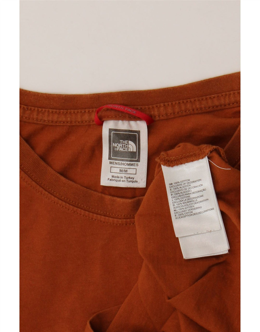 The North Face Herren Grafik-T-Shirt-Oberteil aus mitteloranger Baumwolle