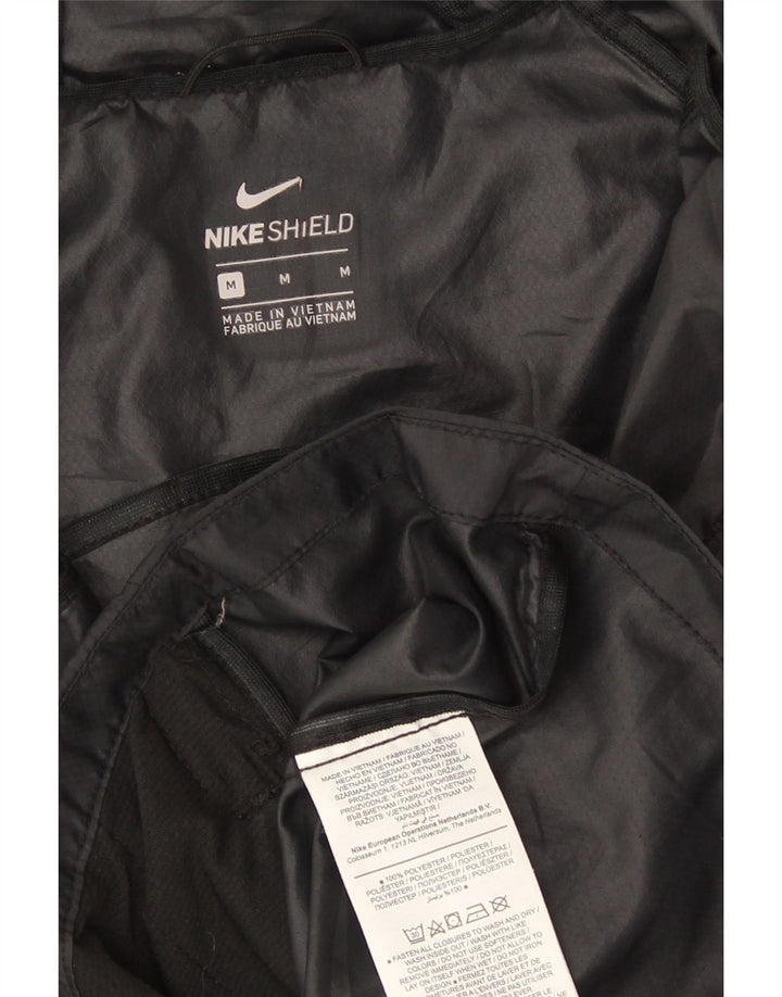 Nike Damen Kapuzen-Regenjacke UK 14 Medium Schwarz Polyester Sport