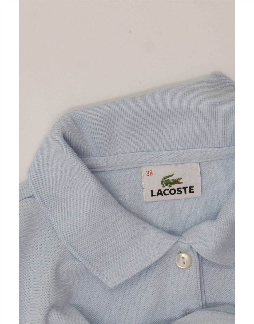 Lacoste Damen Poloshirt Größe 38 Mittelblau