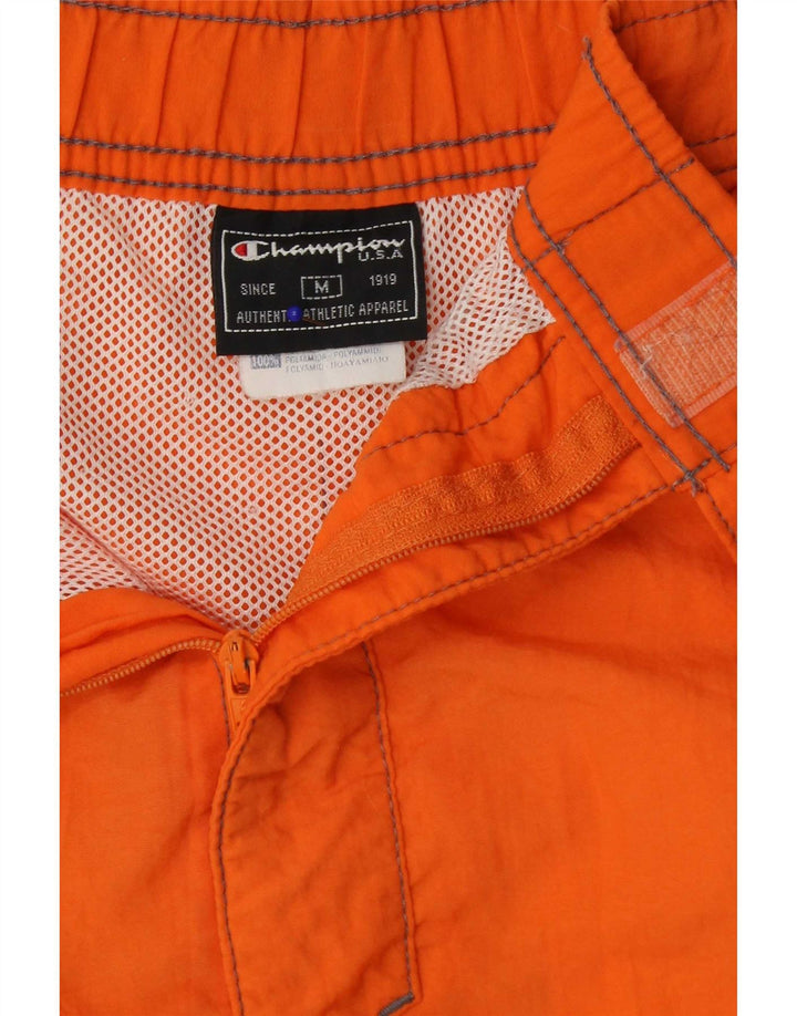 Champion Herren-Badeshorts aus mittelorangefarbenem Colourblock-Polyamid