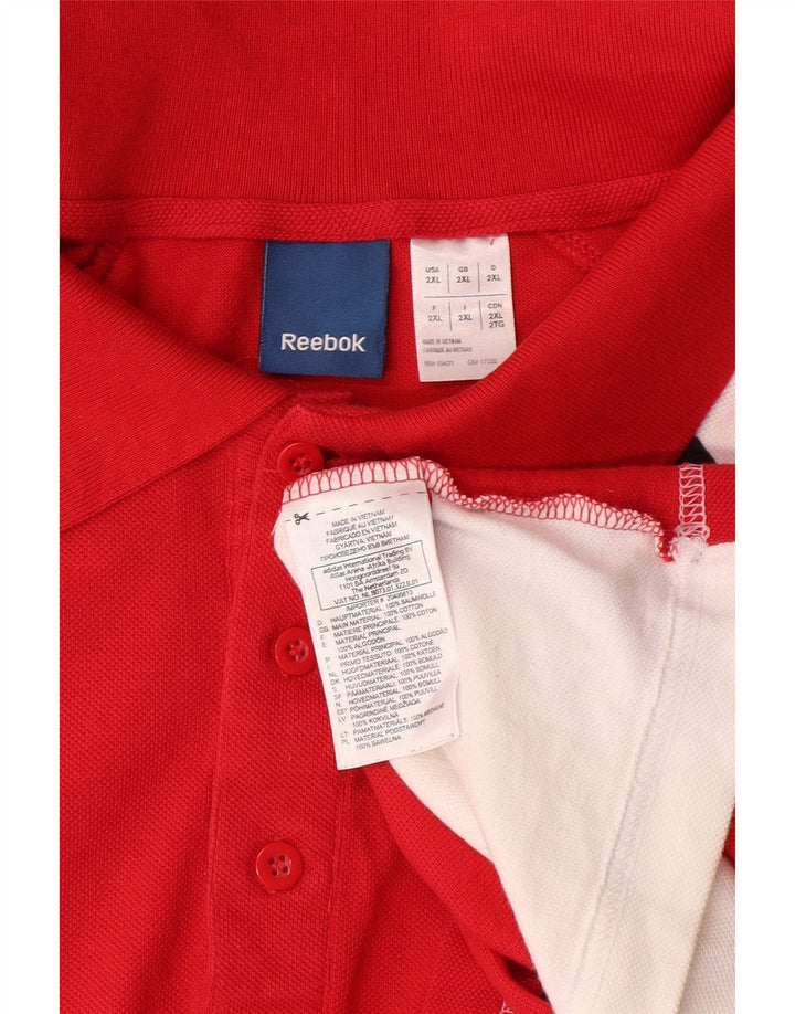 REEBOK Herren-Poloshirt mit Grafik, 2XL, rote Colourblock-Baumwolle
