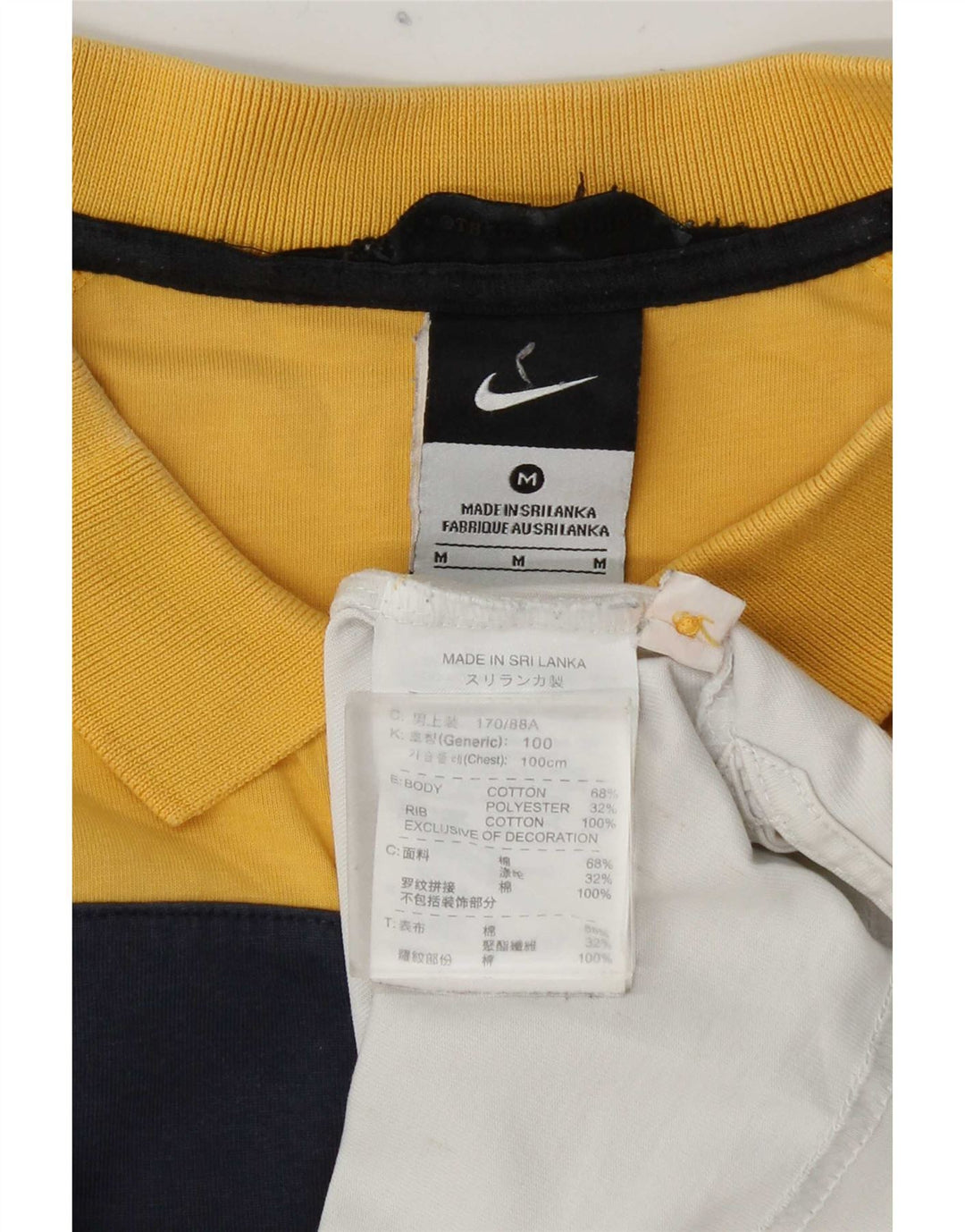 Nike Herren-Poloshirt mit Grafik, mittelgelbe Colourblock-Baumwolle