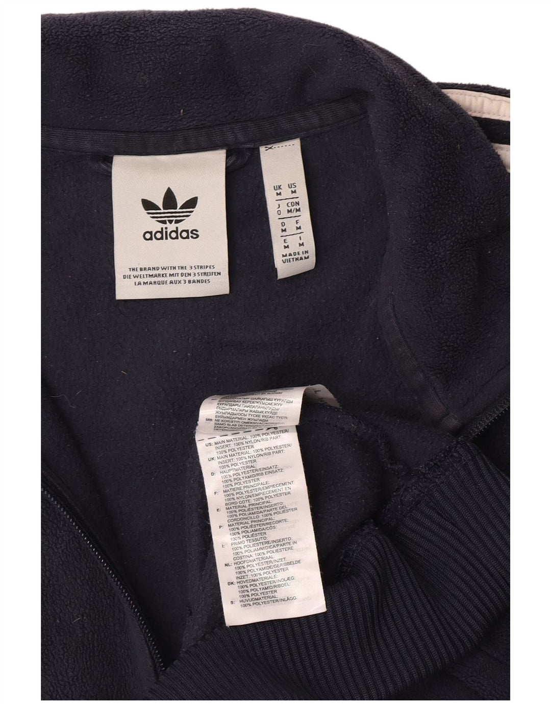 Adidas Herren-Fleecepullover mit Reißverschluss am Hals, mittleres Marineblau, Farbblock-Polyester