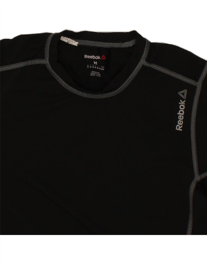 REEBOK Womens T-Shirt Top UK 12 Medium Black Polyester Vintage Reebok and Second-Hand Reebok from Messina Hembry 