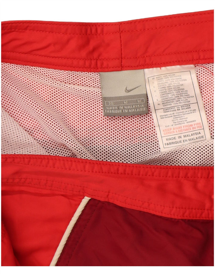 Nike Herren-Badeshorts aus mittelrotem Colourblock-Nylon