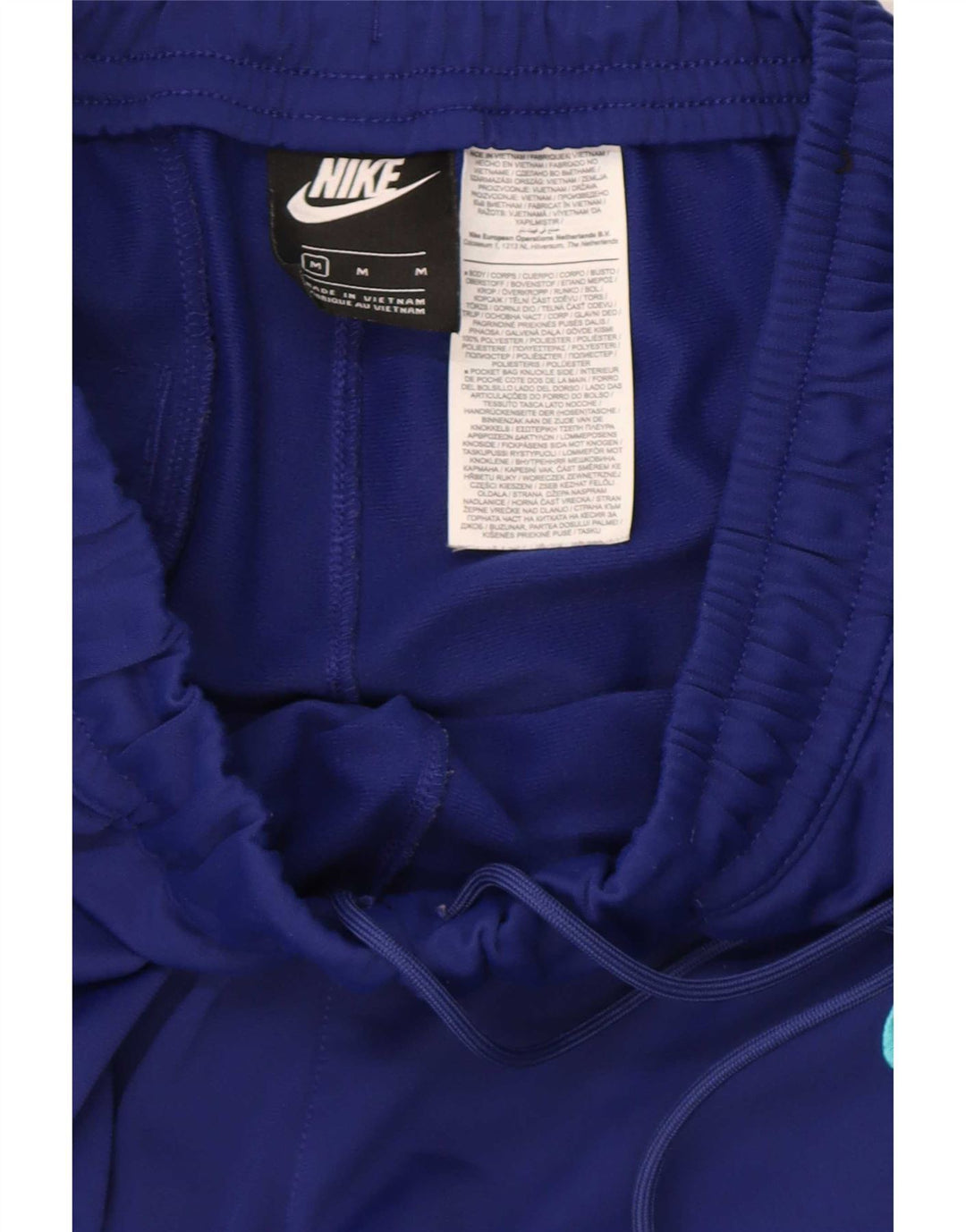 Nike Herren-Trainingshose „Barcelona Graphic“ in mittelblauem Farbblockdesign