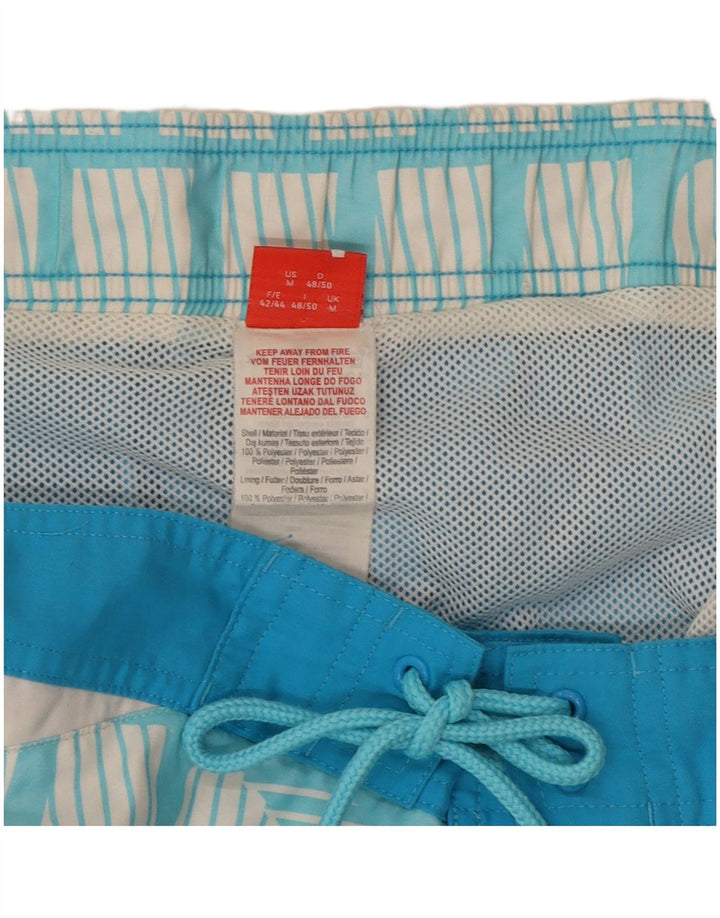 Puma Herren-Badeshorts mit Grafik, mittelblaues Farbblock-Polyester