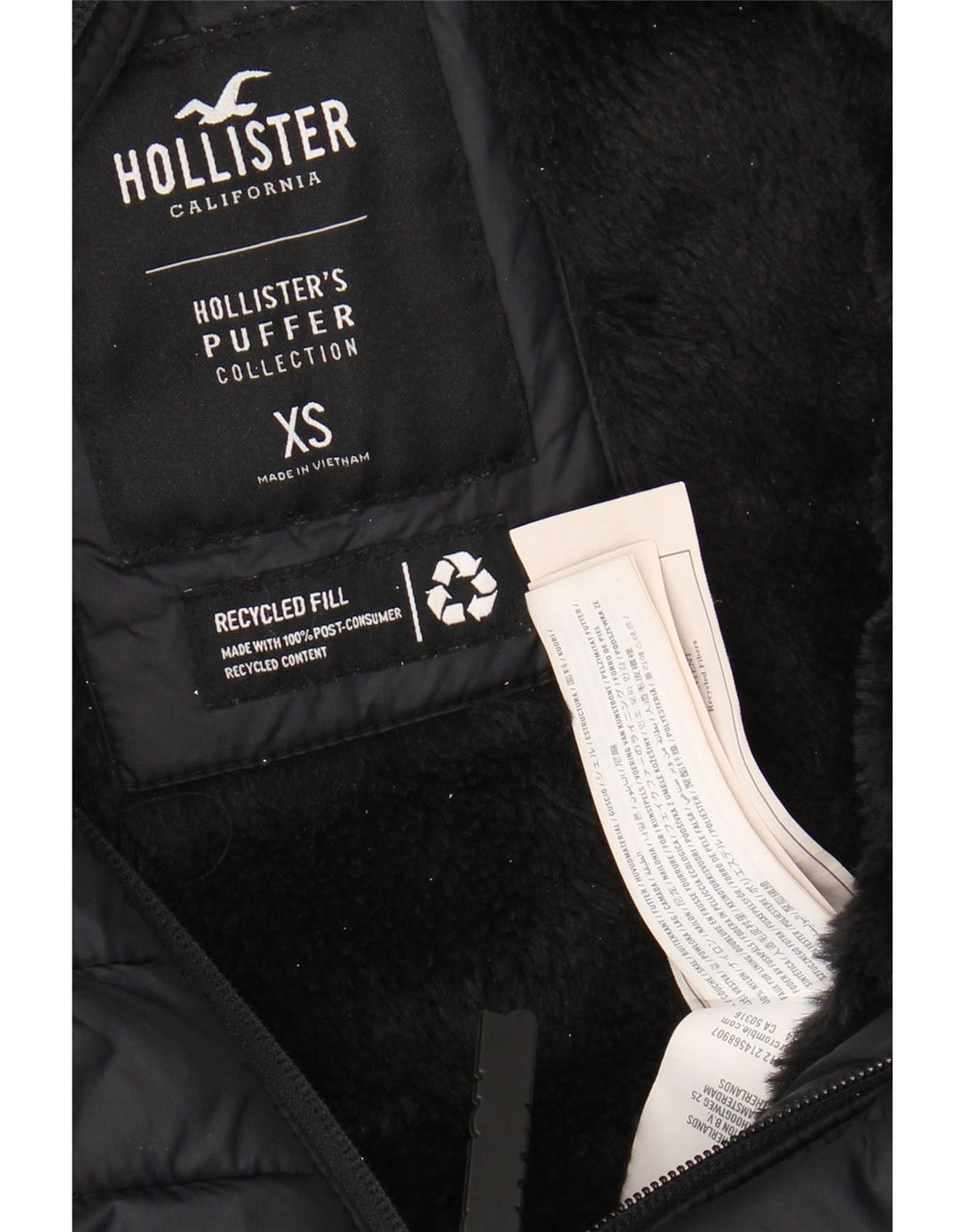 HOLLISTER Wattierte Herrenjacke mit Kapuze, UK 34 XS, schwarzes Nylon