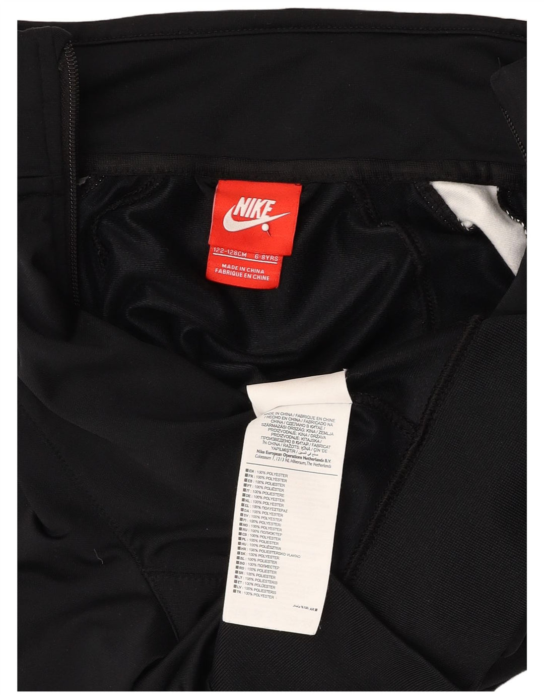 NIKE Girls Tracksuit Top Jacket 6-7 Years XS Black Colourblock Polyester