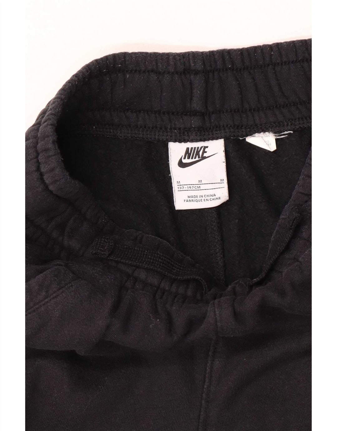 Nike Jungen-Trainingshose mit Grafik, Jogginghose, 10–11 Jahre, mittelgroß, Schwarz