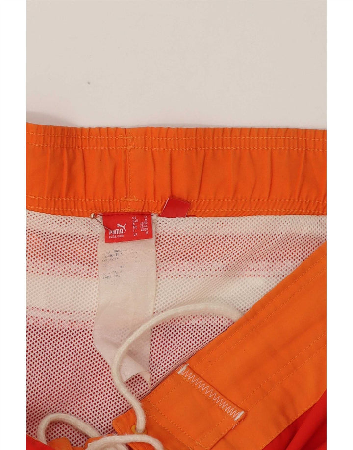 Puma Herren-Badeshorts mit Grafik, Mittelrot, Farbblock