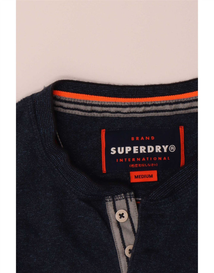 Superdry Herren-Langarmoberteil aus mittelblauer Baumwolle in Marineblau