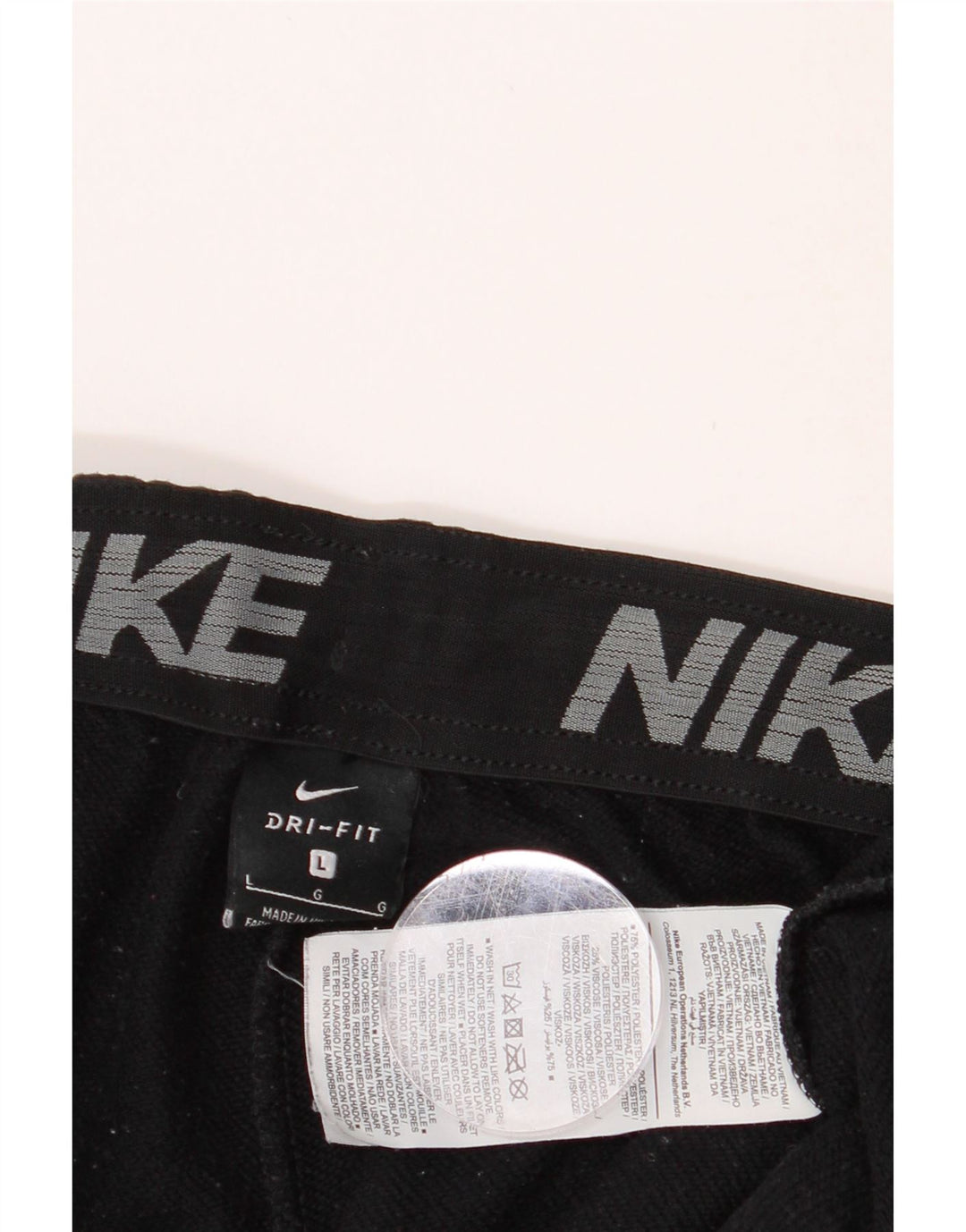 NIKE Mens Tracksuit Trousers Joggers Large Black Polyester Vintage Nike and Second-Hand Nike from Messina Hembry 