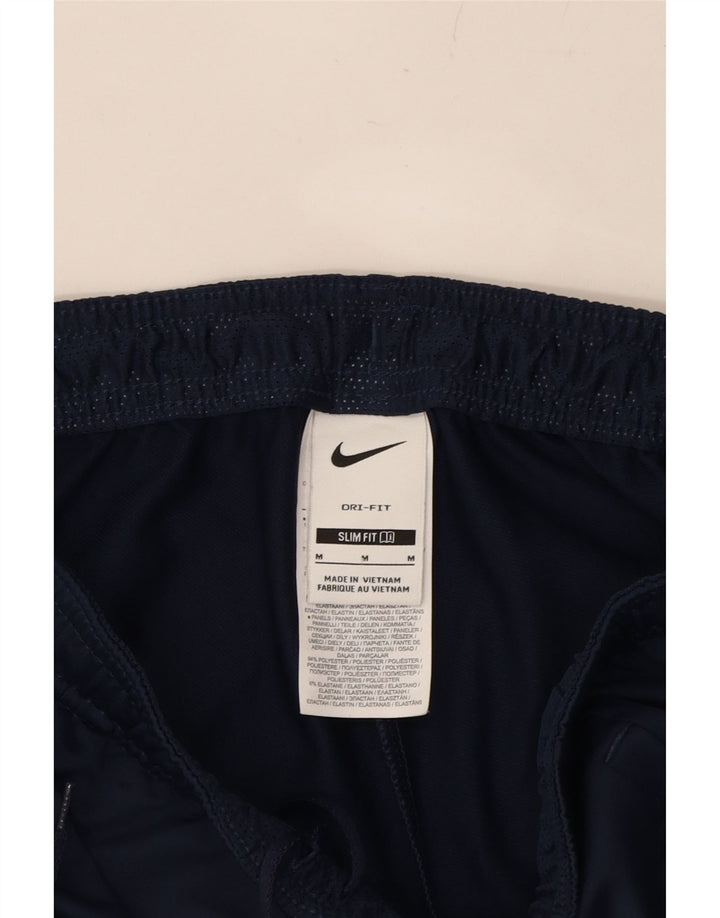 NIKE Mens Dri Fit Slim Fit Tracksuit Trousers Medium  Navy Blue Polyester Vintage Nike and Second-Hand Nike from Messina Hembry 