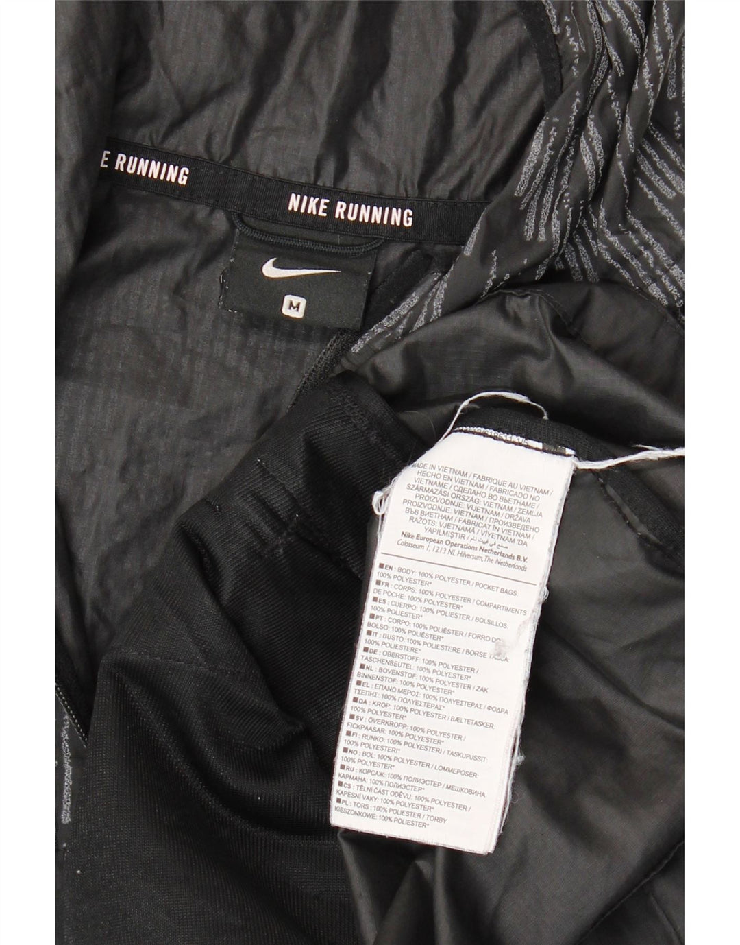 NIKE Damen-Lauf-Regenjacke mit Kapuze, UK 14, mittelschwarz, geometrisch