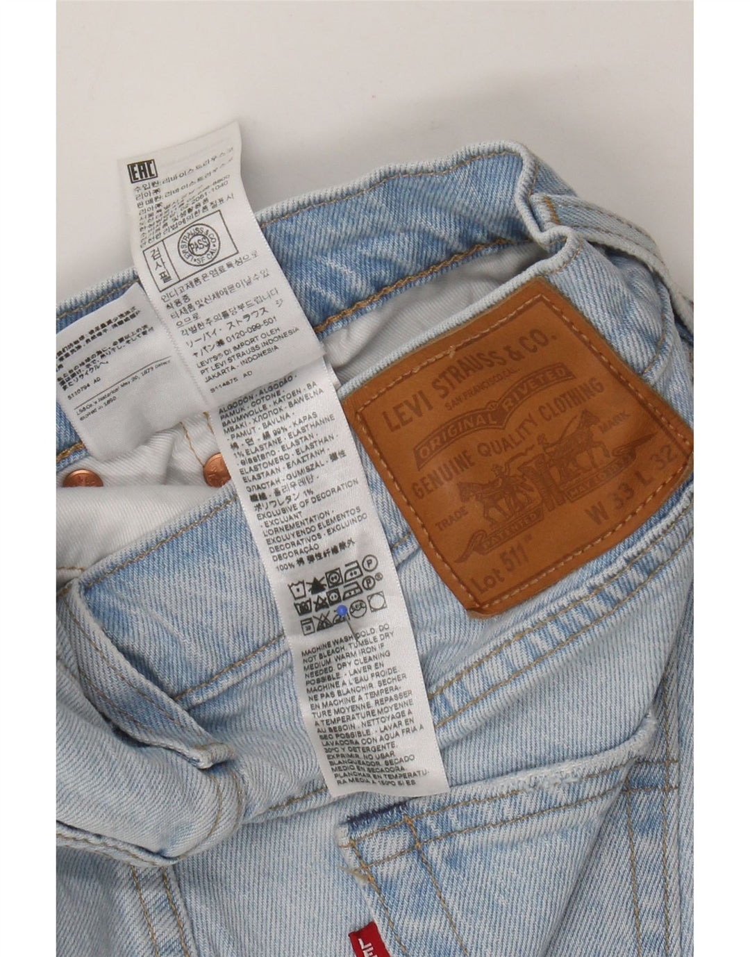 Levi's Damen 511 Distressed Slim Jeans W33 L32 Blaue Patchwork-Baumwolle