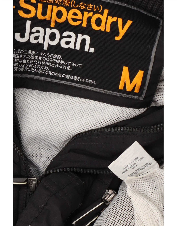 Superdry Damen Regenjacke UK 14 Medium Schwarz