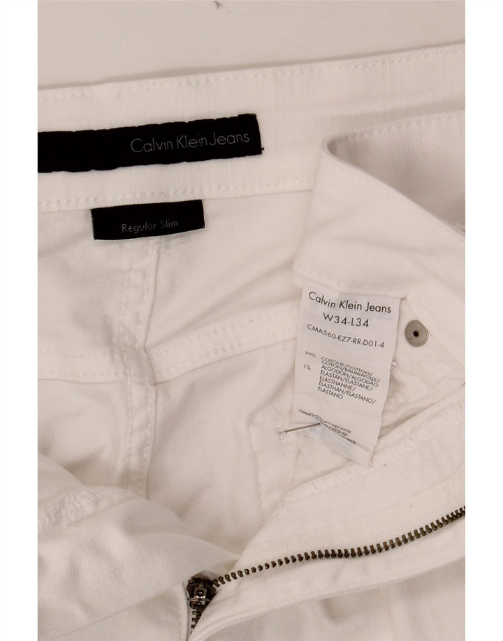CALVIN KLEIN Mens Regular Slim Jeans W34 L34 White Cotton Vintage Calvin Klein and Second-Hand Calvin Klein from Messina Hembry 