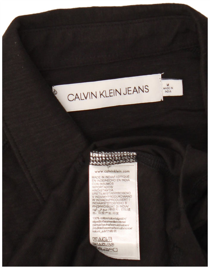 CALVIN KLEIN JEANS Herren-Poloshirt mit Grafik, mittelschwarze Baumwolle