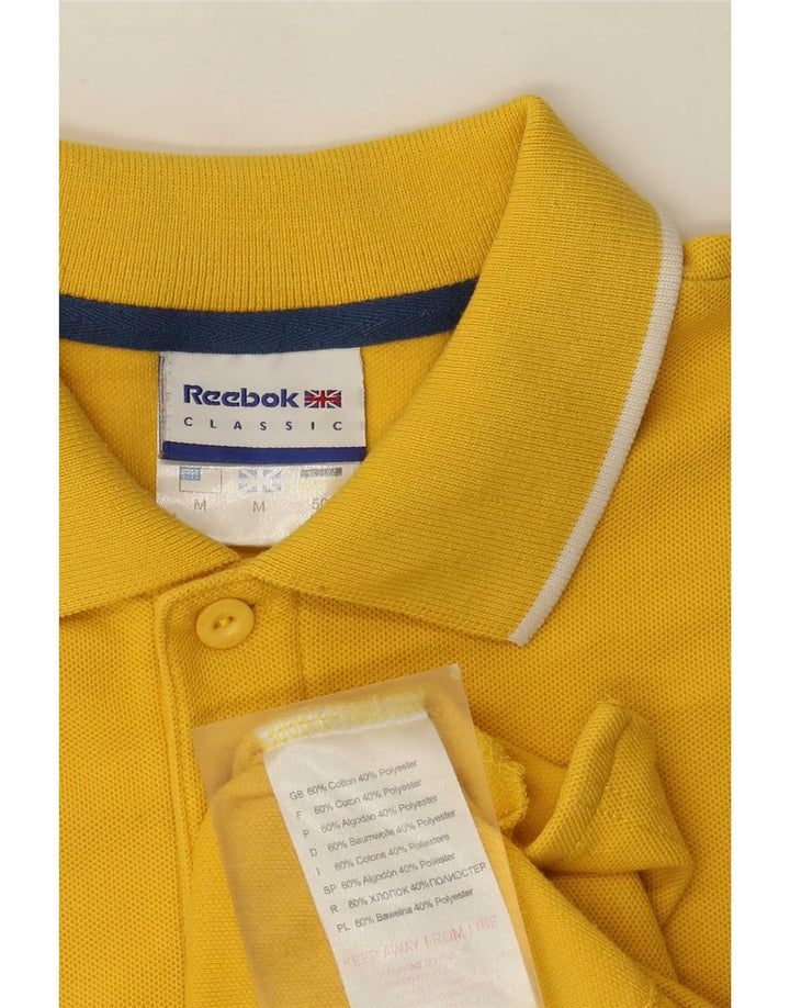 Reebok Herren klassisches Poloshirt aus mittelgelber Baumwolle