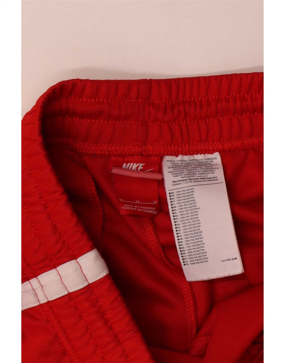 Nike Herren-Sportshorts aus mittelrotem Colourblock-Polyester