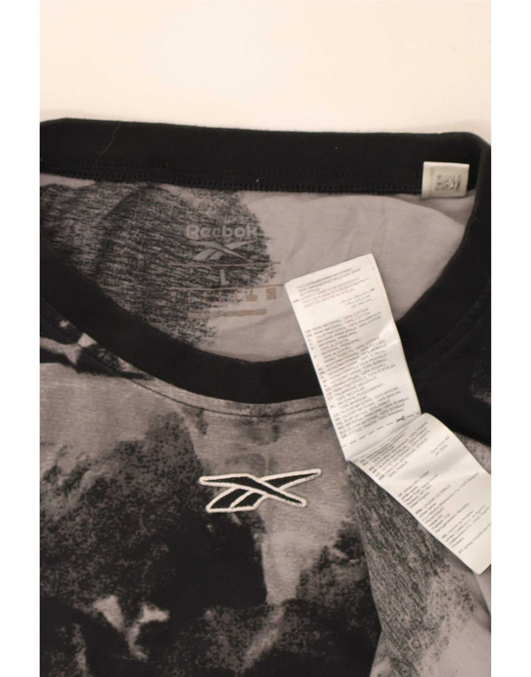 Reebok Herren T-Shirt mit abstraktem Muster, groß, aus schwarzer Baumwolle