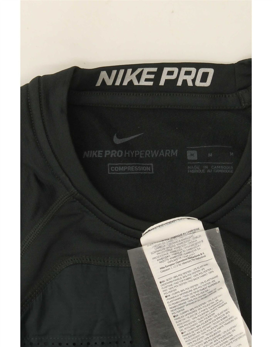 Nike Herren-Grafikoberteil mit langen Ärmeln, Mittelgrünes Farbblock-Polyester