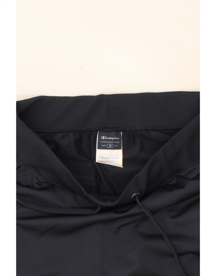 CHAMPION Womens Tracksuit Trousers UK 14 Medium Navy Blue Polyester Vintage Champion and Second-Hand Champion from Messina Hembry 