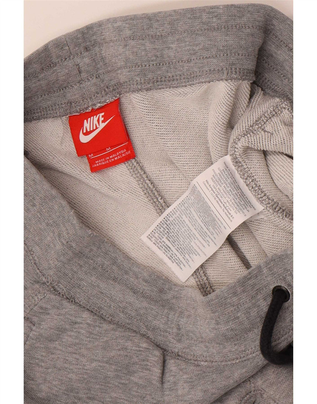 Nike Herren-Trainingshose mit Grafik, mittelgraue Baumwolle
