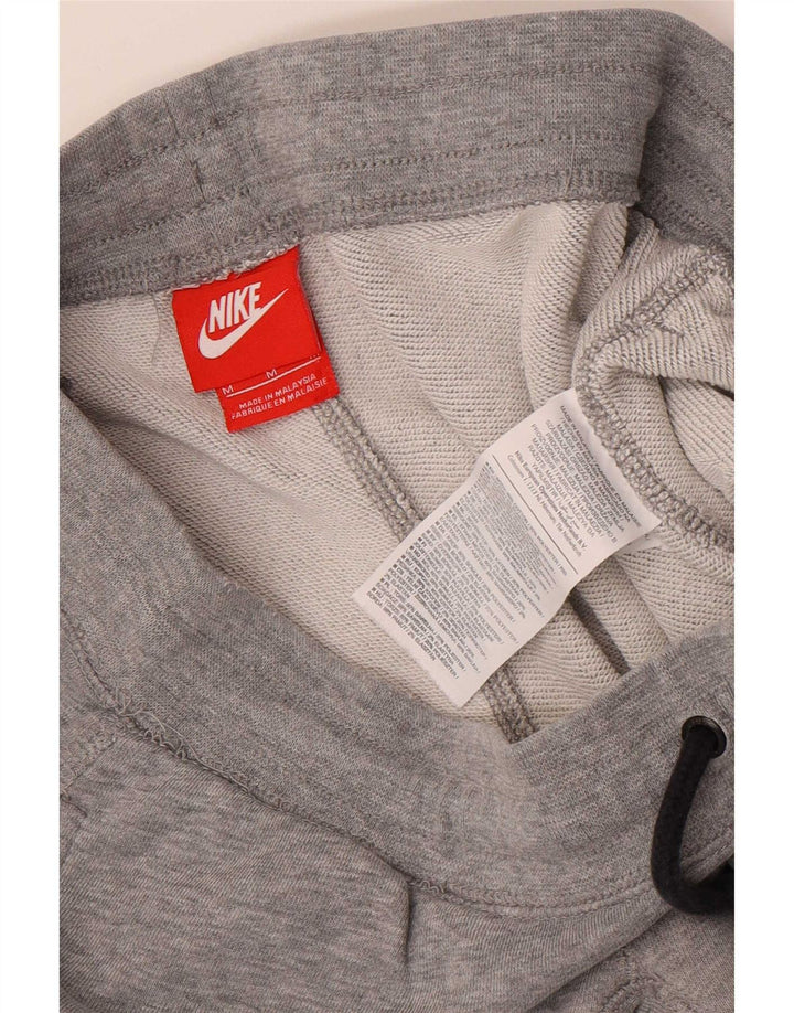 Nike Herren-Trainingshose mit Grafik, mittelgraue Baumwolle
