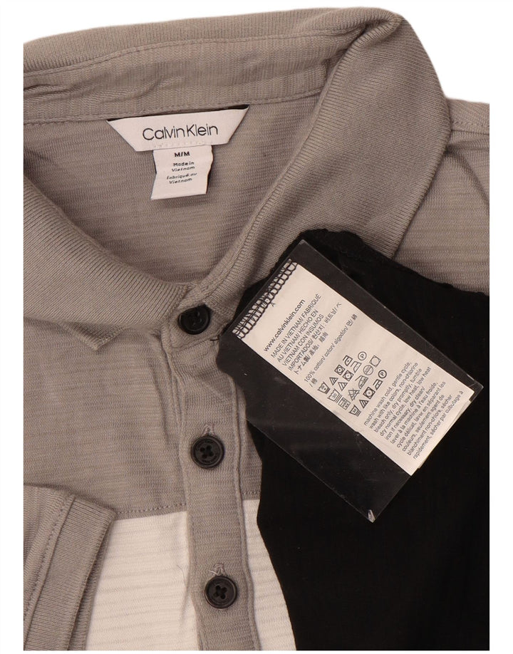 CALVIN KLEIN Herren-Poloshirt aus mittelschwarzer Colourblock-Baumwolle
