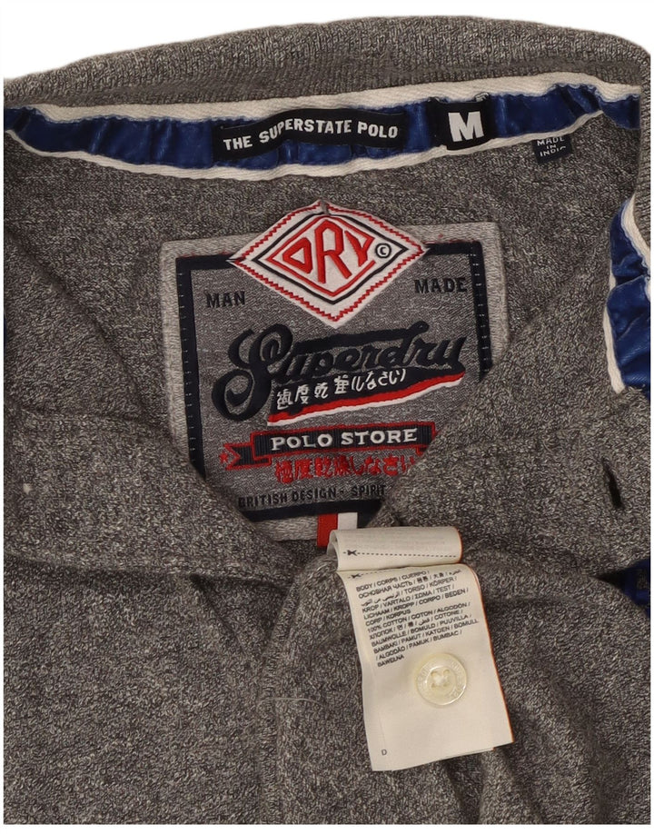SUPERDRY Herren-Poloshirt aus mittelgrauer Baumwolle mit Grafik