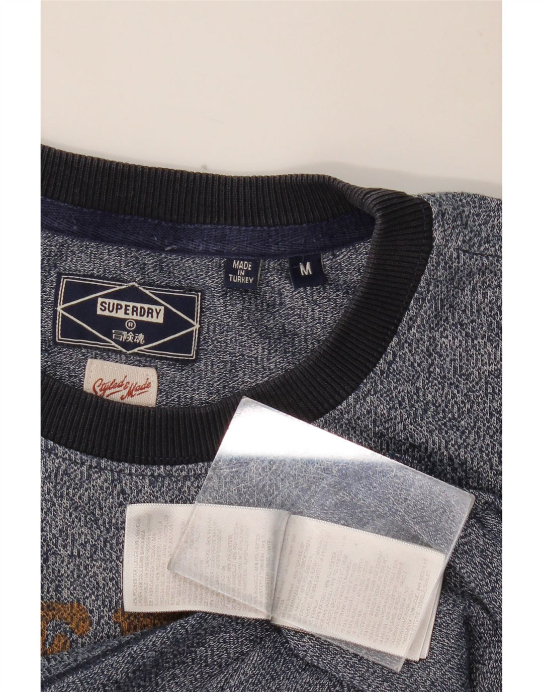 SUPERDRY Grafisches T-Shirt-Oberteil für Herren aus mittelblau gesprenkelter Baumwolle