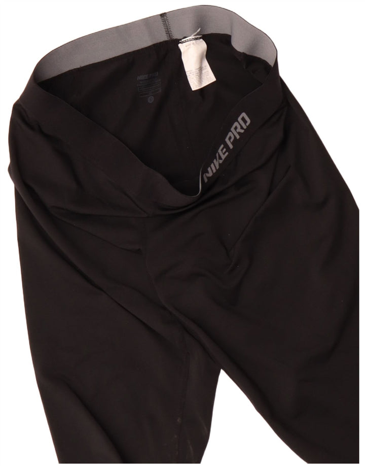 Nike Damen-Capri-Leggings mit Grafik, Größe 26, Größe L, Schwarz, Polyester