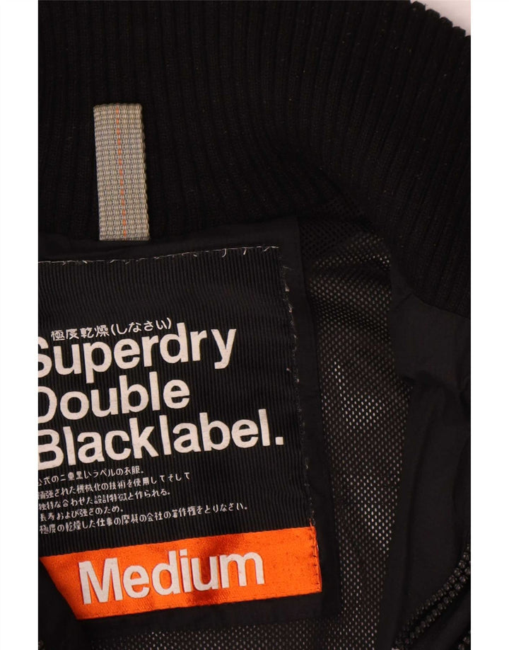 Superdry Damen Windjacke UK 14 Mittelschwarzes Polyester
