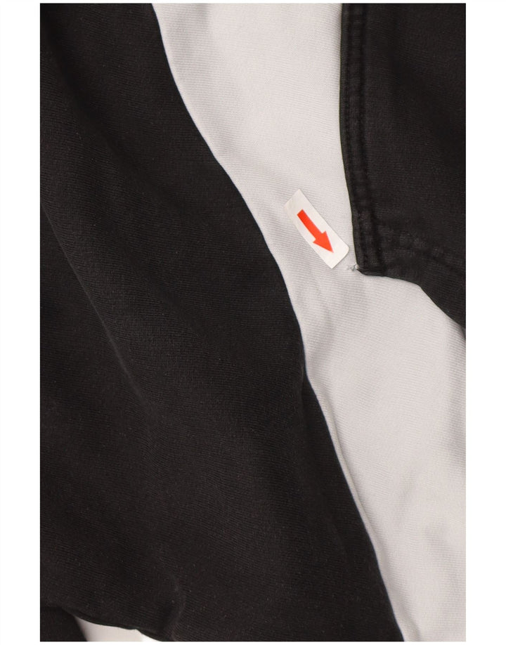 PUMA Herren Kapuzenpullover Mittelschwarz Colourblock Baumwolle