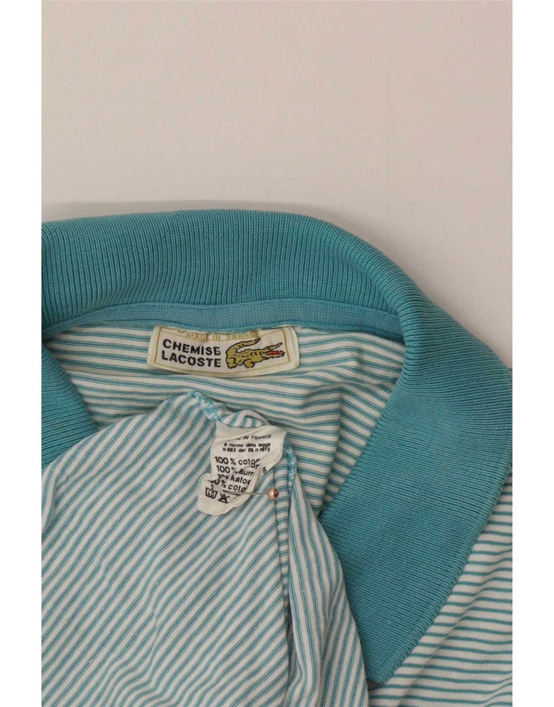 Lacoste Herren-Poloshirt aus mittelblauer, gestreifter Baumwolle