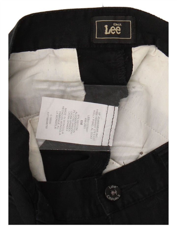 LEE Damen-Caprihose mit hoher Taille, konisch zulaufend, US 6, M, W30, L20, Schwarz