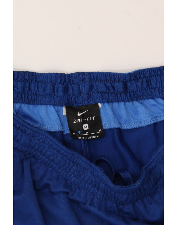 NIKE Mens Dri Fit Tracksuit Trousers Medium  Blue Colourblock Vintage Nike and Second-Hand Nike from Messina Hembry 