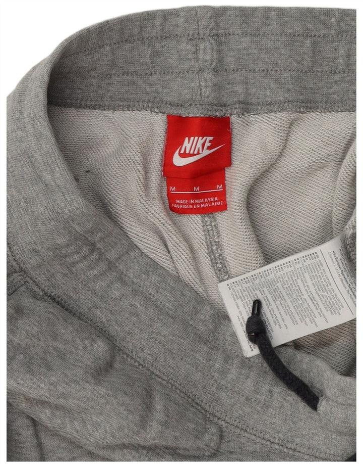 NIKE Herren-Trainingshose mit Grafik, mittelgraue Baumwolle