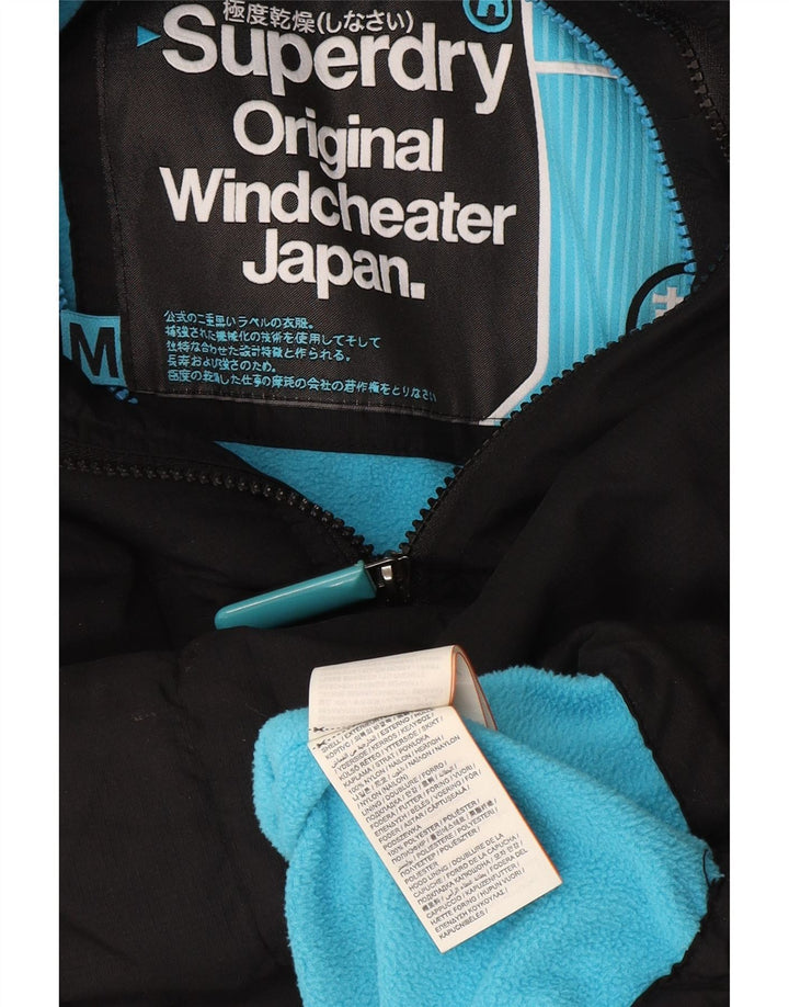 Superdry Damen Windcheater Kapuzen-Windjacke UK 14 Medium Schwarz