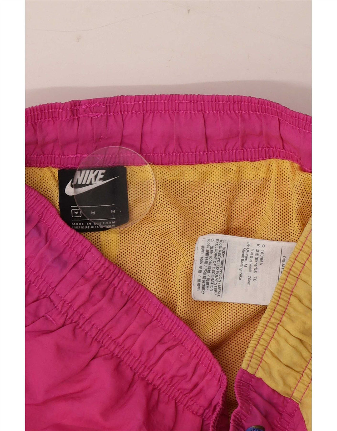 Nike Herren-Sportshorts aus mittelrosa Colourblock-Nylon