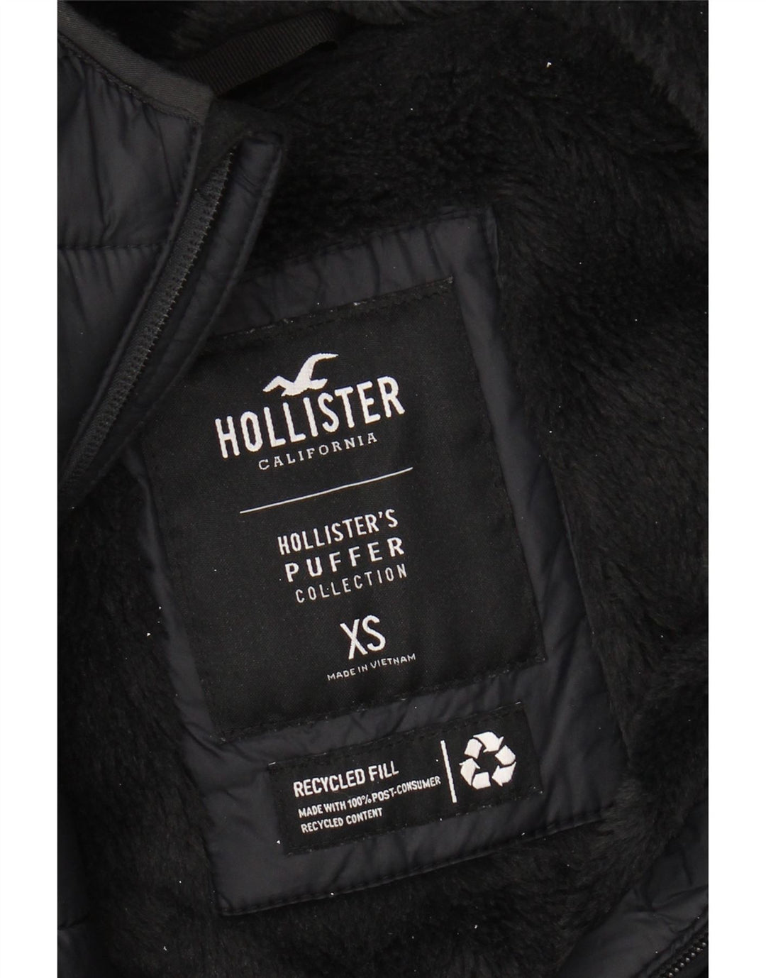 HOLLISTER Wattierte Herrenjacke mit Kapuze, UK 34 XS, schwarzes Nylon