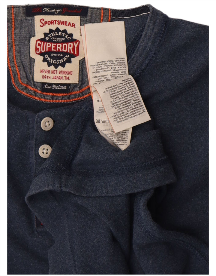 Superdry Herren-Langarmoberteil aus mittelblauer Baumwolle