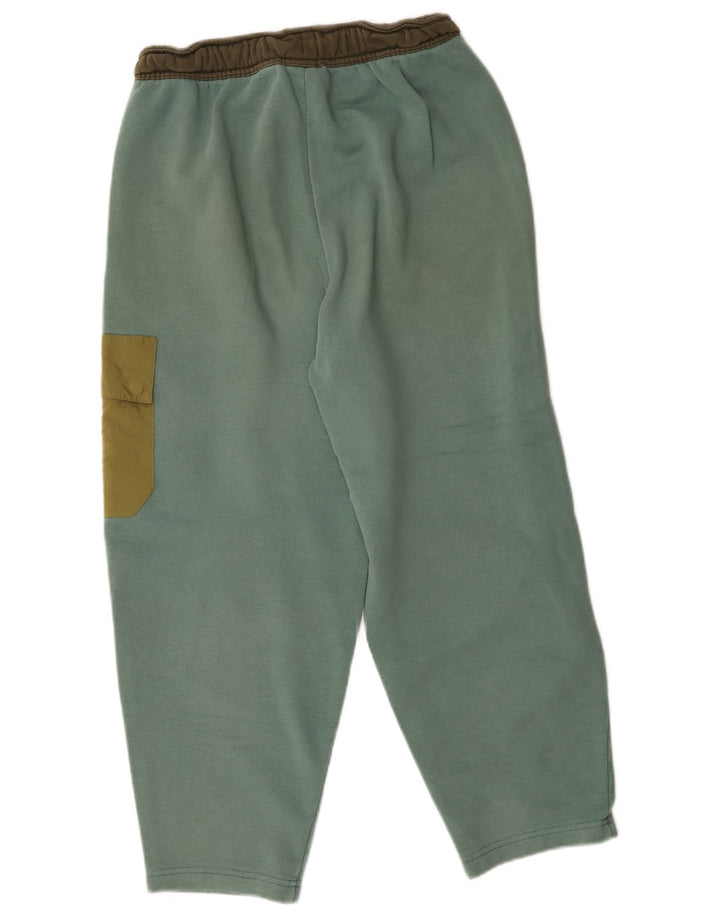 Nike Herren Cargo-Trainingshose, Jogginghose, Mittelgrün, Farbblock