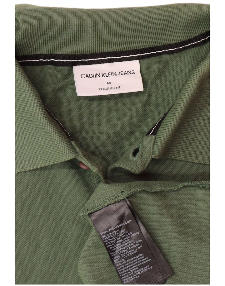 CALVIN KLEIN JEANS Herren-Poloshirt mit normaler Passform, mittlerer Khaki-Baumwolle und Grafik